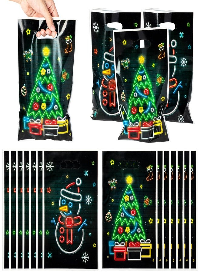 ANGOLIO 50Pcs Christmas Glow in the Dark Favors Bags Print Christmas Tree Snowman Candy Treat Bags with Handles Plastic Gifts Snack Bags Party Favor Supplies Back to School for Kids - Image 1